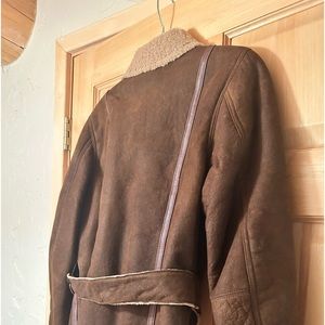 Sundance Leather and Shearling Coat . Belted with button details
